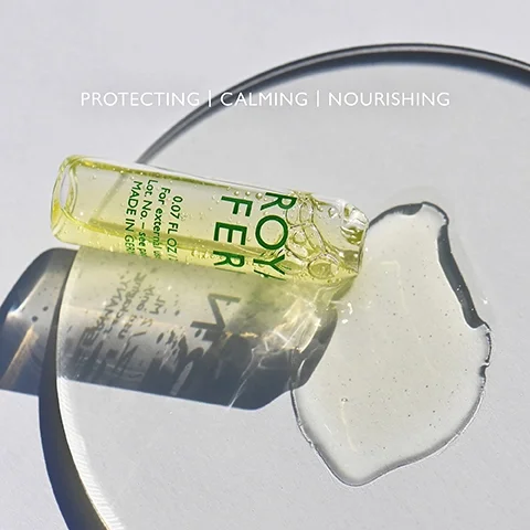 Product capsule and droplet on a clear palette with the text PROTECTING, CALMING, NOURISHING.