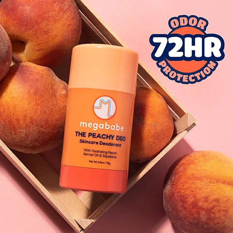Image 1 - An orange and coral deodorant stick sits next to peaches in a wooden crate against a pink background, with text reading megababe THE PEACHY DEO Skincare Deodorant With Hydrating Peach Kernel Oil & Squalane Net Wt 2.6oz / 75g ODOR 72HR PROTECTION. Image 2 - A peach colored deodorant stick sits among peaches, next to a peach icon with text reading Fresh peach vanilla with hints of sea salt & nectar, and the deodorant reads megababe THE PEACHY DEO Skincare Deodorant With Hydrating Peach Kernel Oil & Squalane Net Wt. 2.6oz / 75g. Image 3 - An orange Megababe The Peachy Deo skincare deodorant stick next to a smear of the product on an orange background with overlay text reading Squalane restores the skins natural protective barrier megababe THE PEACHY DEO Skincare Deodorant With Hydrating Peach Kernel Oil & Squalane Net Wt. 2.6oz / 75g Peach kernel oil revitalizes & conditions skin. Image 4 - A peach and pink Megababe deodorant stick is displayed alongside a sun sticker that reads Dont leave me in the sun I MIGHT MELT and the deodorant label reads megababe THE PEACHY DEO Skincare Deodorant With Hydrating Peach Kernel Oil & Squalane Net Wt 2.6oz / 75g. Image 5 - A woman smiles with her eyes closed while applying deodorant to her underarm, next to text that reads How to: The Peachy Deo STEP 1: Apply daily as often as needed to clean, dry skin STEP 2: Allow 2 weeks for pits to adjust from a traditional antiperspirant. Image 6 - A hand holds an orange and peach colored deodorant stick on an orange background next to text that lists No aluminum No baking soda No parabens No sulfates No phthalates and the deodorant text reads megababe THE PEACHY DEO Skincare Deodorant With Hydrating Peach Kernel Oil & Squalane Net Wt 2.6oz / 75g. Image 7 - An infographic explaining how to open deodorant by twisting, not pulling, with the text Open your deo the right way! TWIST DONT PULL Megababe deodorants are made with 100% natural ingredients, so theyre super gentle (just like your skin!). To keep your deo in perfect shape, follow these easy steps when opening: Pulling the inner dome straight off can cause your deo to break inside—oh no! Instead: Twist up the deodorant slightly until a little product peeks out. Gently twist off the inner dome to release pressure before use. Keep your deo happy & ready to swipe! blue heart icon.