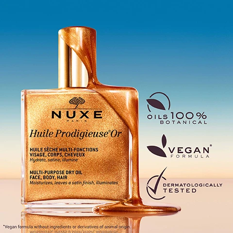 Image 1 - A close-up of a golden, shimmering bottle of NUXE Huile Prodigieuse Or with visible text highlighting that it is a multi-purpose dry oil for face, body, and hair, and is vegan, dermatologically tested, and made from 100% botanical oils.
Image 2 - A close-up view of a persons legs seated with slightly crossed knees, showing skin before and after treatment with visible text that reads BEFORE on the left and AFTER on the right, along with UNRETOUCHED IMAGE at the bottom.
Image 3 - Close-up of lips with a glossy finish being applied with a yellow-tipped applicator, featuring the text MOISTURISED LIPS FOR 95% OF USERS.