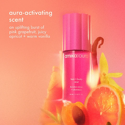 Image 1 - A bright pink Amika Aura hair and body mist bottle is centered among grapefruit slices, apricots, and a vanilla bean and flower, with text reading aura-activating scent an uplifting burst of pink grapefruit, juicy apricot + warm vanilla, and on the bottle amika:aura hair + body mist brume corps + cheveux 90 ML / 3 US FL. OZ. Image 2 - A vibrant image of various fruits and botanicals including an orange, a sliced apricot, a vanilla bean, a slice of pink grapefruit, a peach, lily of the valley flowers, and a piece of sandalwood, all set against a pink and orange gradient background, with text overlay reading the iconic amika scent, APRICOT, VANILLA, LILY OF THE VALLEY, PINK GRAPEFRUIT, SANDALWOOD. Image 3 - A woman with curly hair and closed eyes looks upward as a mist sprays near her neck, with the text a scent you can feel designed to uplift + impossible not to share visible in the bottom left. Image 4 - A woman with curly hair sprays a pink bottle onto her hair against a pink background, with the bottle labeled amika:aura hair + body mist hydra-spray refresh + shine, and text alongside her reading aura your way on its own to scent skin + strands layered with other amika products on-the-go to reapply when you need it. Image 5 - An Amika Perk Up dry shampoo can and an Amika Aura hair and body mist bottle are displayed against a pink background, with overlay text reading designed to layer, refresh hair + build scent at the root, and spritz the same scent on strands + skin. Image 6 - A pink bottle of Amika Aura hair and body mist is displayed against a pink background next to a list of its features including amika:aura hair + body mist brume corps + cheveux 90 ML / 3 US FL. OZ., vegan, cruelty-free, sulfate-free, paraben-free, phthalate-free, and free from gluten contributors.